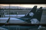 Grupo Aeromexico airplanes at Benito Juarez International Airport (MEX) in Mexico City, Mexico, on Tuesday, May 25, 2021. Mexico's aviation-safety ranking has been downgraded by the U.S., prohibiting an expansion of flights from the nations carriers to its northern neighbor.