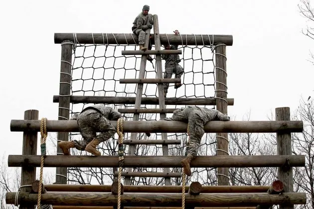 Soldiers with the U.S. Army's Second Infantry Division negotiate obstacles during an a training course at Camp Casey in Dongducheon, South Korea on, Feb. 26, 2013