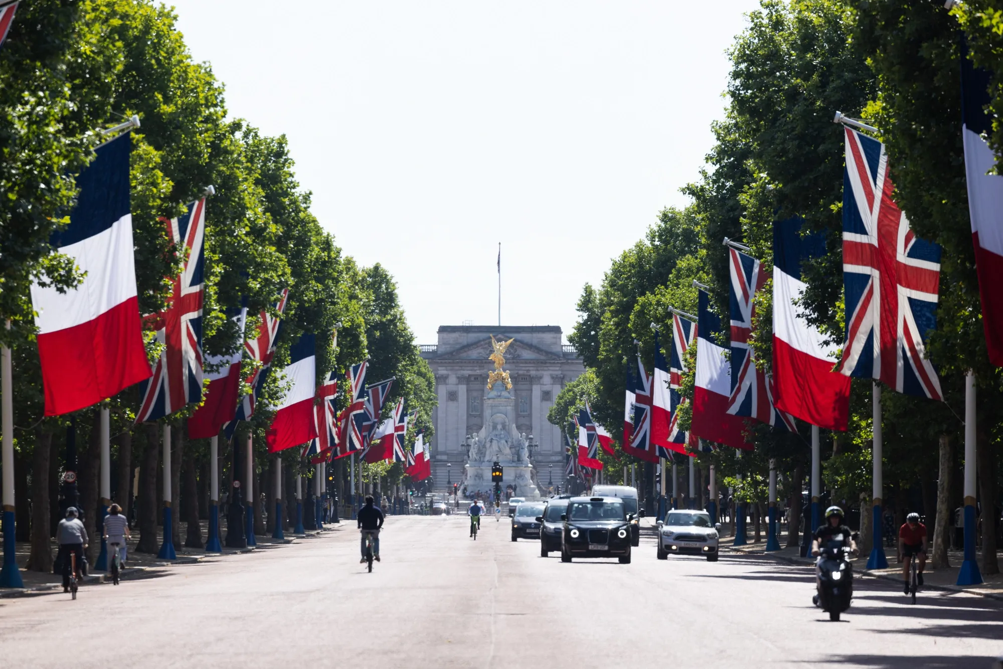 UK-France Migration Deal and Nuclear Pact Show Value of Closer Ties -  Bloomberg