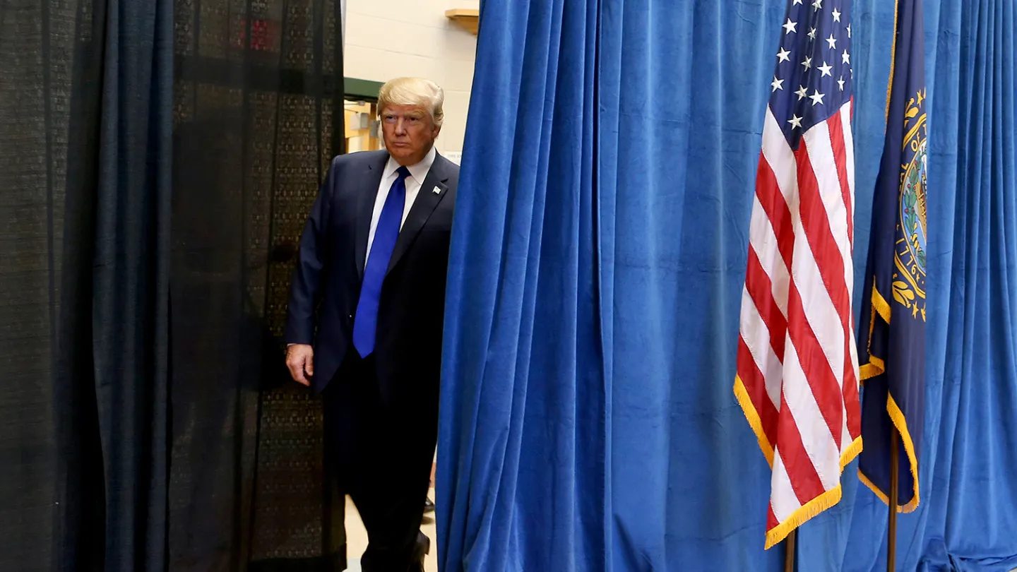 Republican presidential candidate businessman Donald Trump enters a media availability ahead of a campaign town hall, Wednesday, Aug. 19, 2015, at Pinkerton Academy in Derry, N.H.
