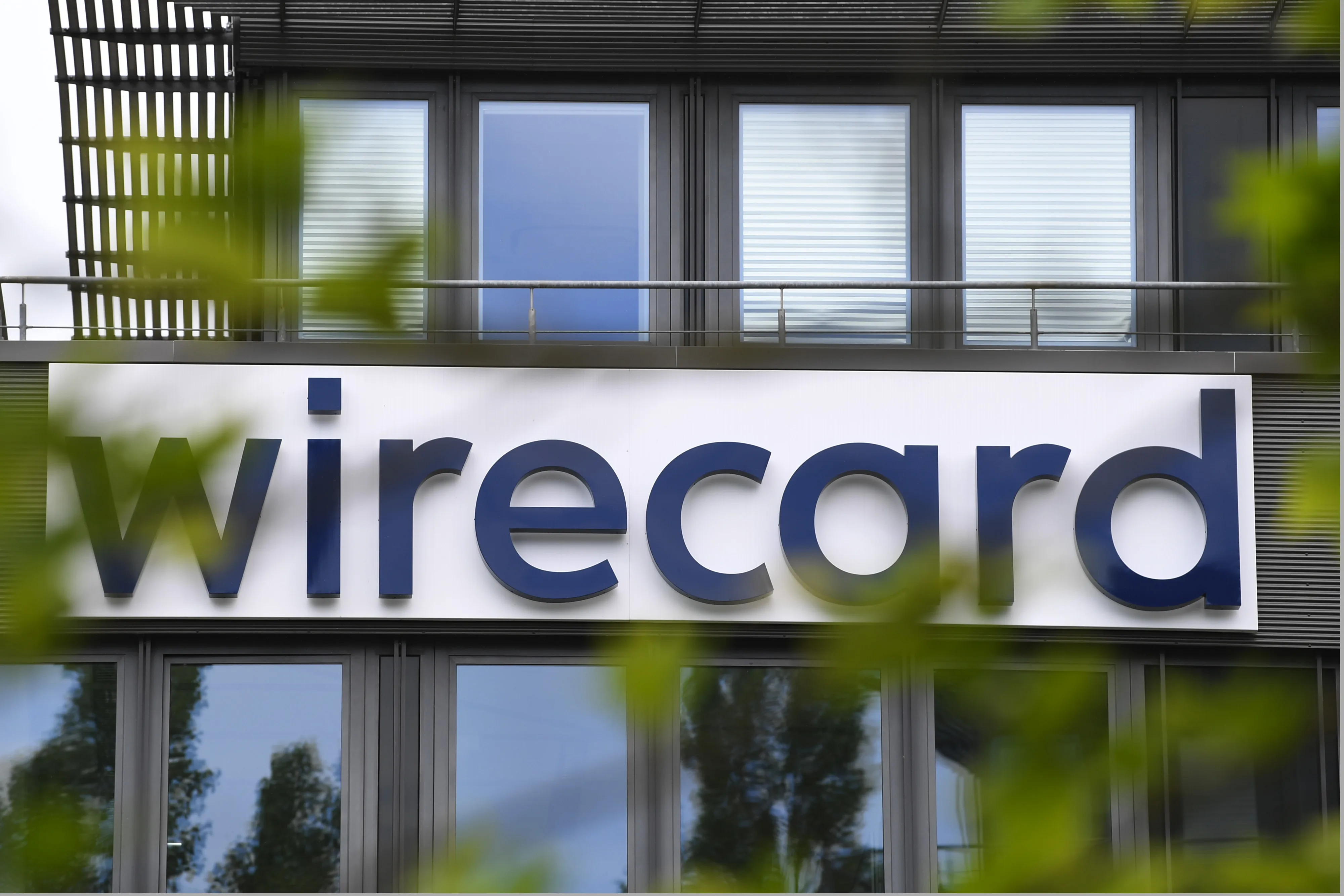The Wirecard AG logo sits on the company's headquarters in Munich.
