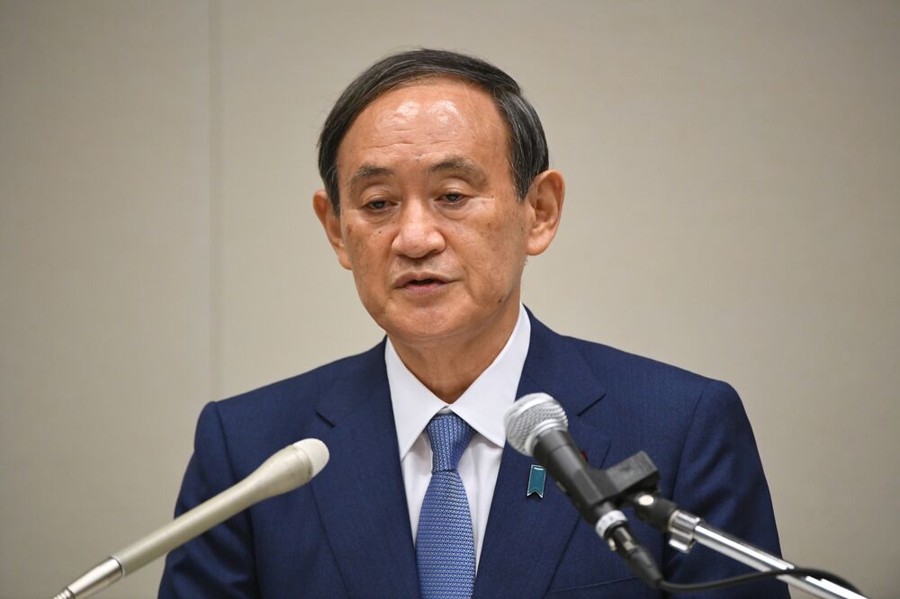 菅官房長官が自民総裁選に出馬表明 アベノミクス 前に進める Bloomberg