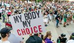 Abortion rights demonstrators march at the Federal Courthouse Plaza in Austin, Texas, on June 24.