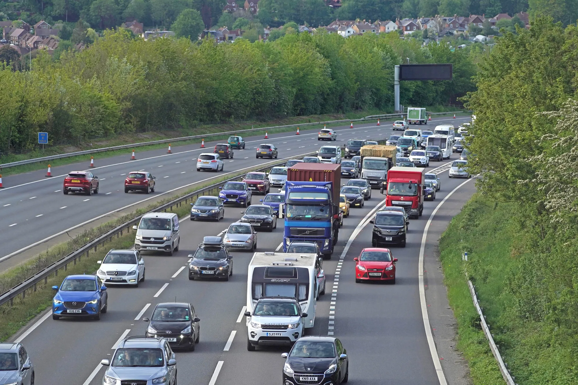 Traffic builds up on the M3 highway heading towards the coast, at Winchester, U.K., on May 28.