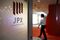 Tokyo Stock Exchange and Stock Boards As Japan Shares Dip With Banks As Volatility Returns to Markets