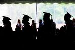 Graduating seniors line up to receive their diplomas during commencement at Wellesley College in Wellesley, Massachusetts, in 2017.