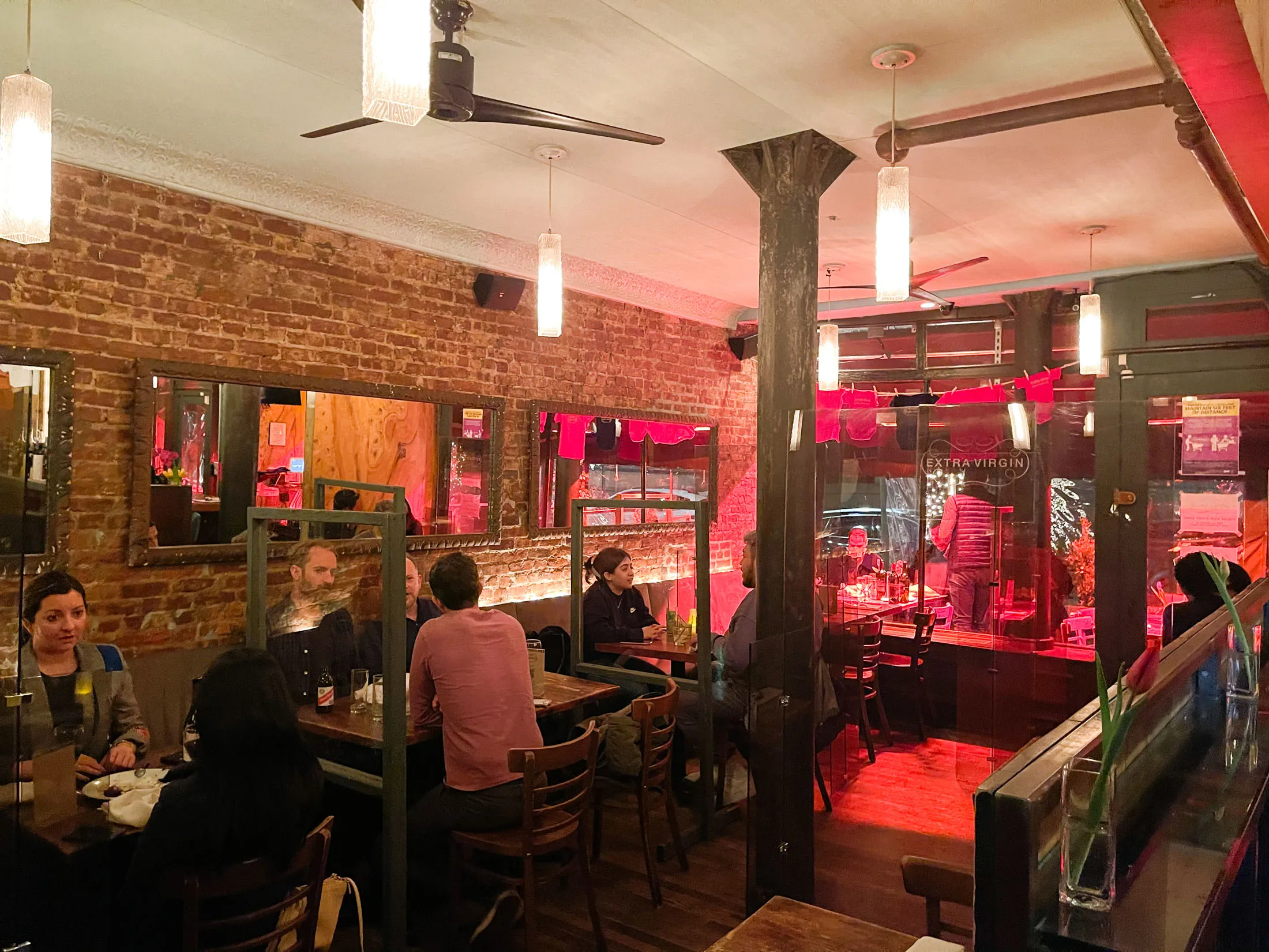Eating indoors at Extra Virgin in the West Village.