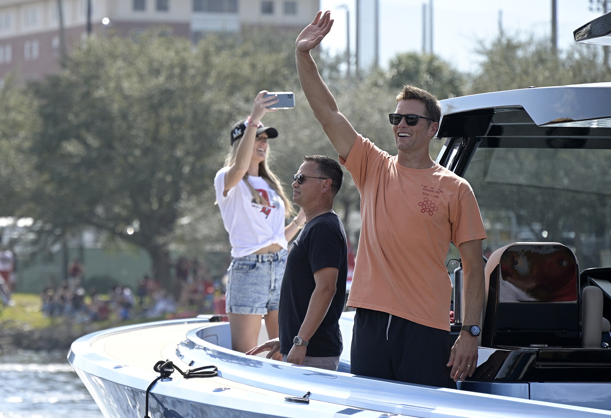 Tom Brady and Bruce Arians arrive for the Super Bowl boat parade 