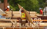 Construction workers are seen at a new building site in Silver Spring, Maryland, U.S. June 2, 2016.