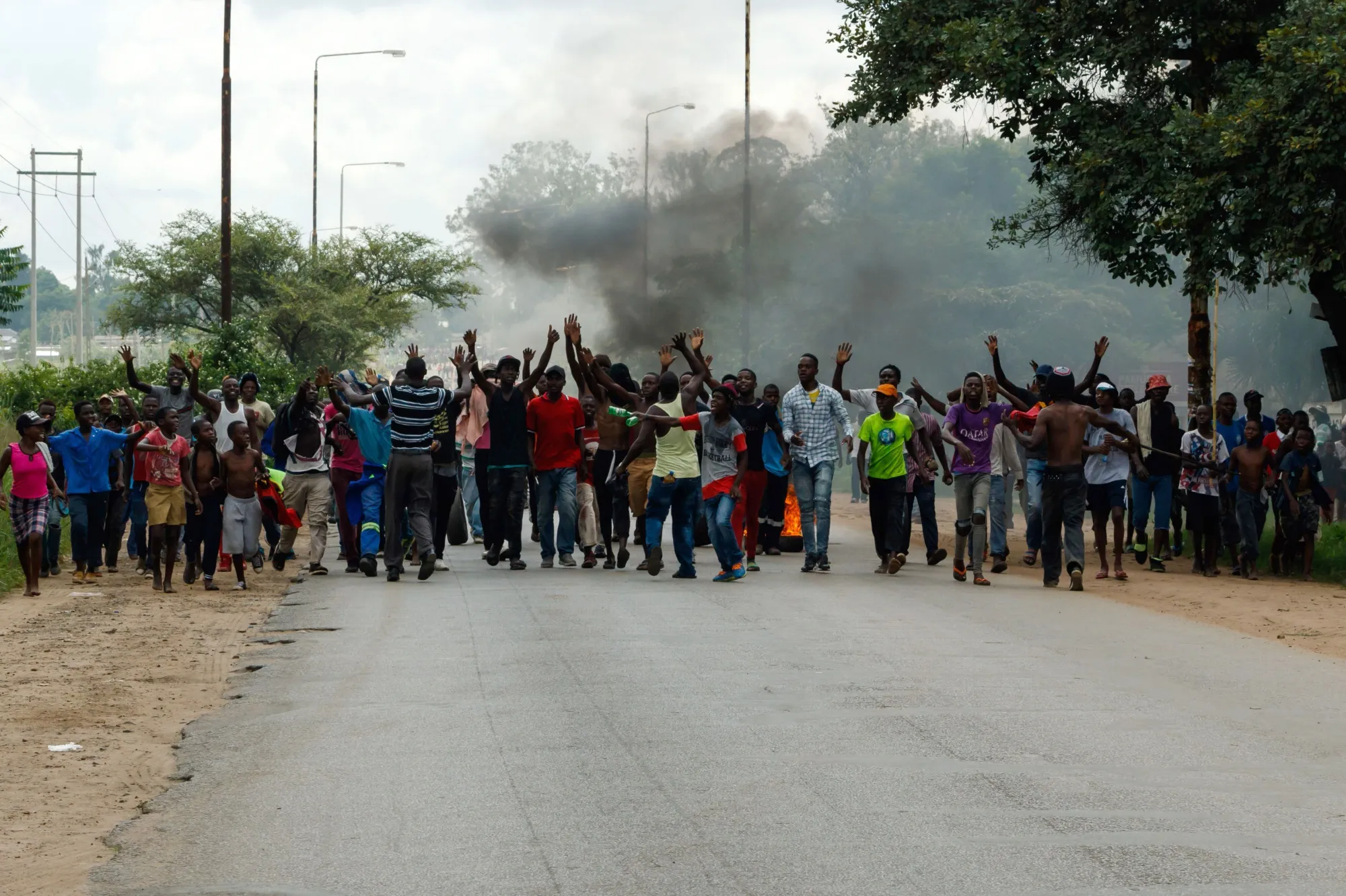 Protesters&nbsp;block the main route to Zimbabwe's capital Harare from Epworth township on Jan.&nbsp;14.