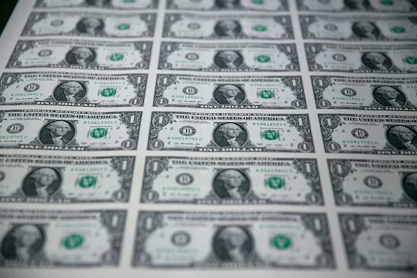 Operations At The Bureau Of Engraving And Printing As The $1 Bill Is Printed