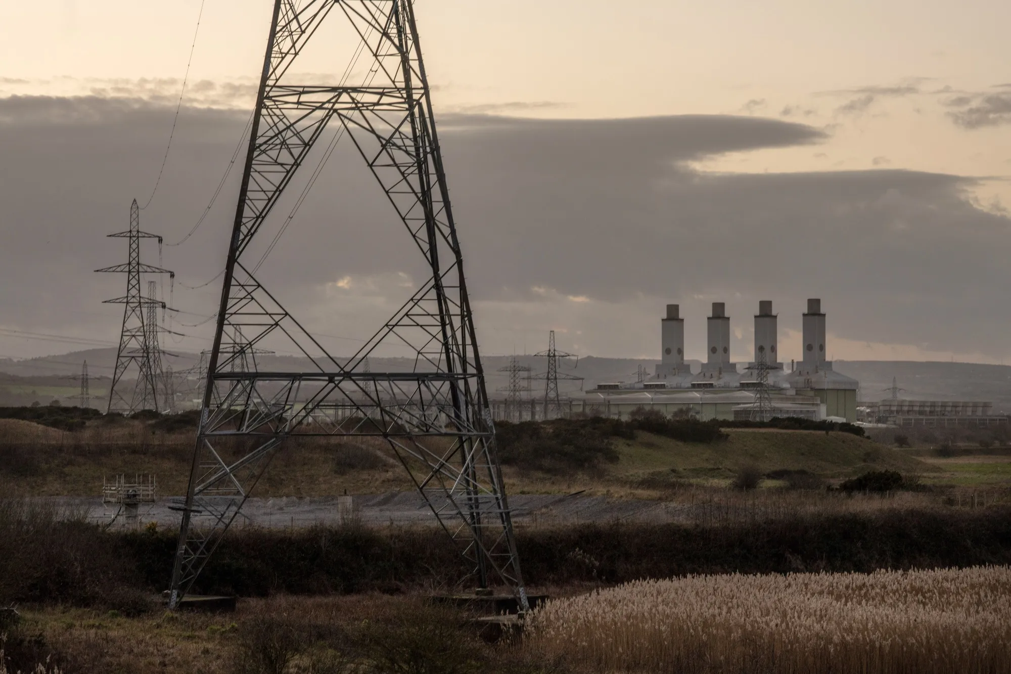 High voltage electricity transmission towers next to Uniper SE’s Connah's Quay power station in Flint, North Wales.