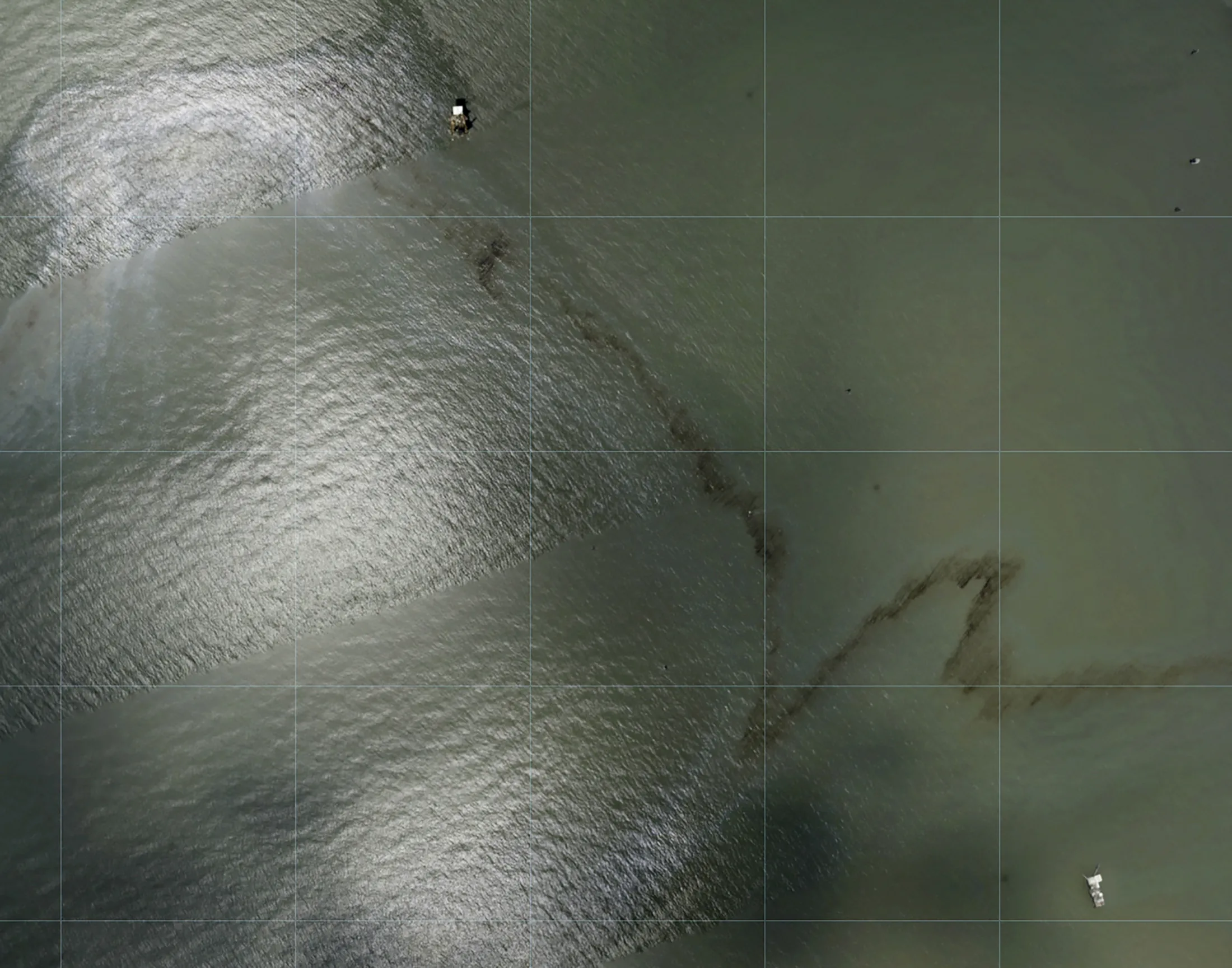 Photos captured by National Oceanic and Atmospheric Administration aircraft shows a black slick&nbsp;floating in the Gulf of Mexico on&nbsp;Aug. 31.