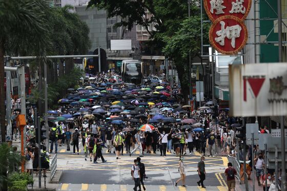 Hong Kong Protests May Put Bankers Back to Working From Home