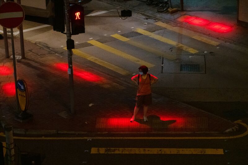 relates to Red Lights at Hong Kong Crosswalks Are Helping Phone Zombies Cross the Street