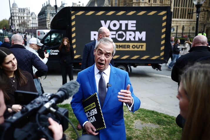 Reform UK leader Nigel Farage speaks to members of the media at an event ahead of local elections in May, in London, on April 10.
