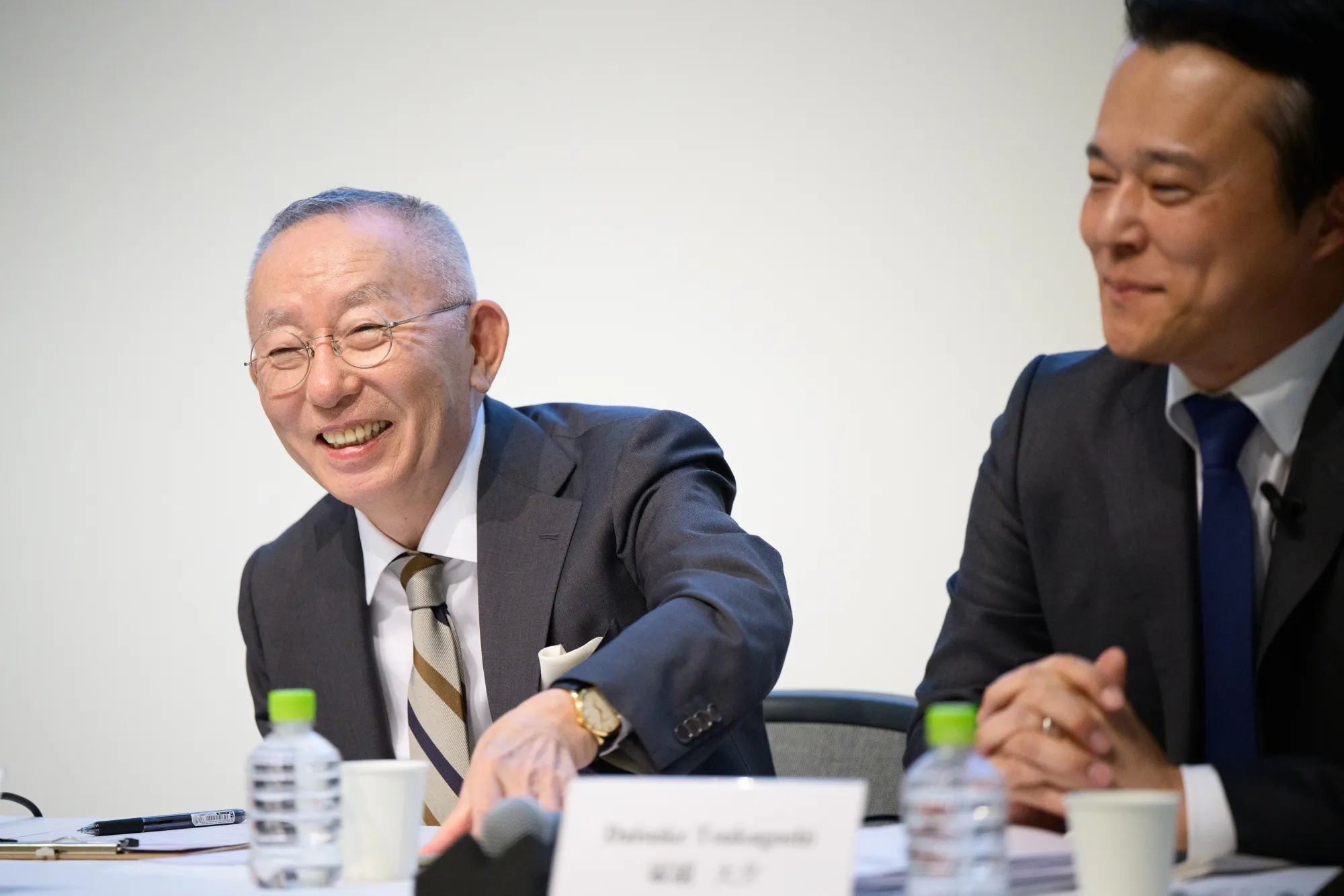 Tadashi Yanai, left, during a news conference in Tokyo on April 9.