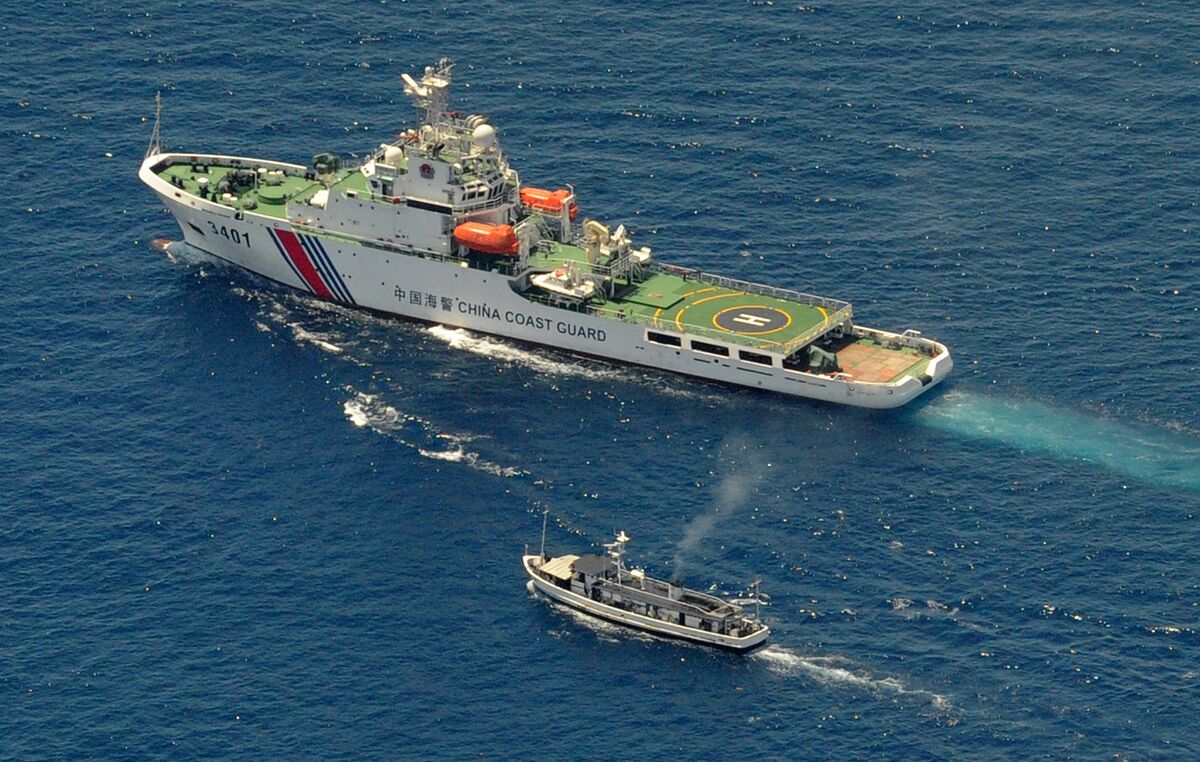 China adopts law allowing coastguard fire on foreign ships