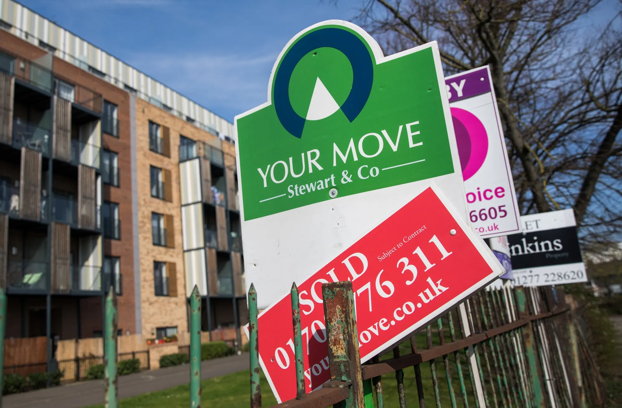 Estate agents sign dadvertising a property as sold at residential apartments in Romford.