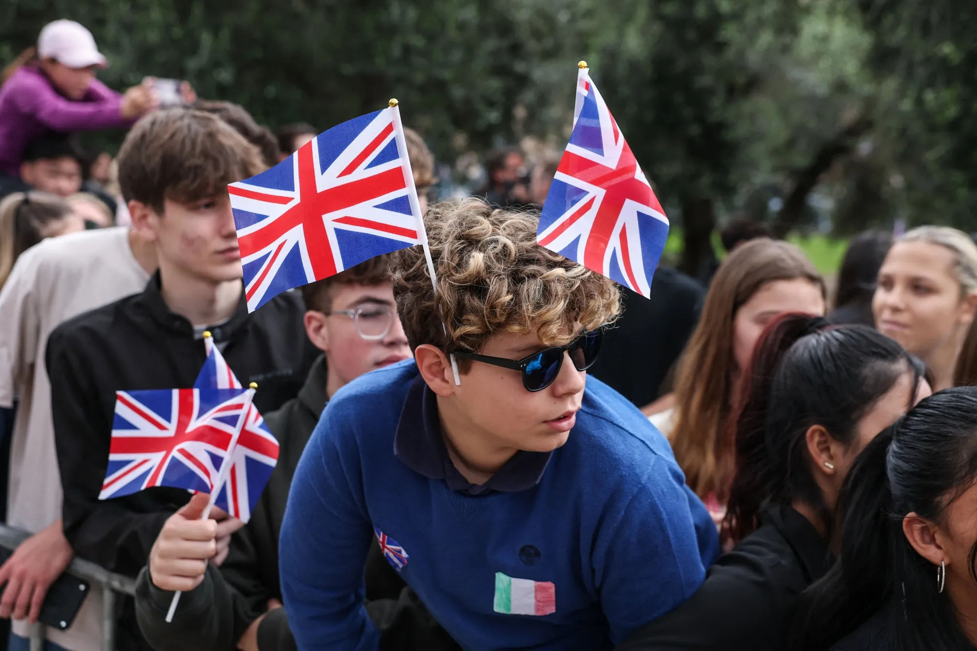 A youth wears Union Jack flags.
