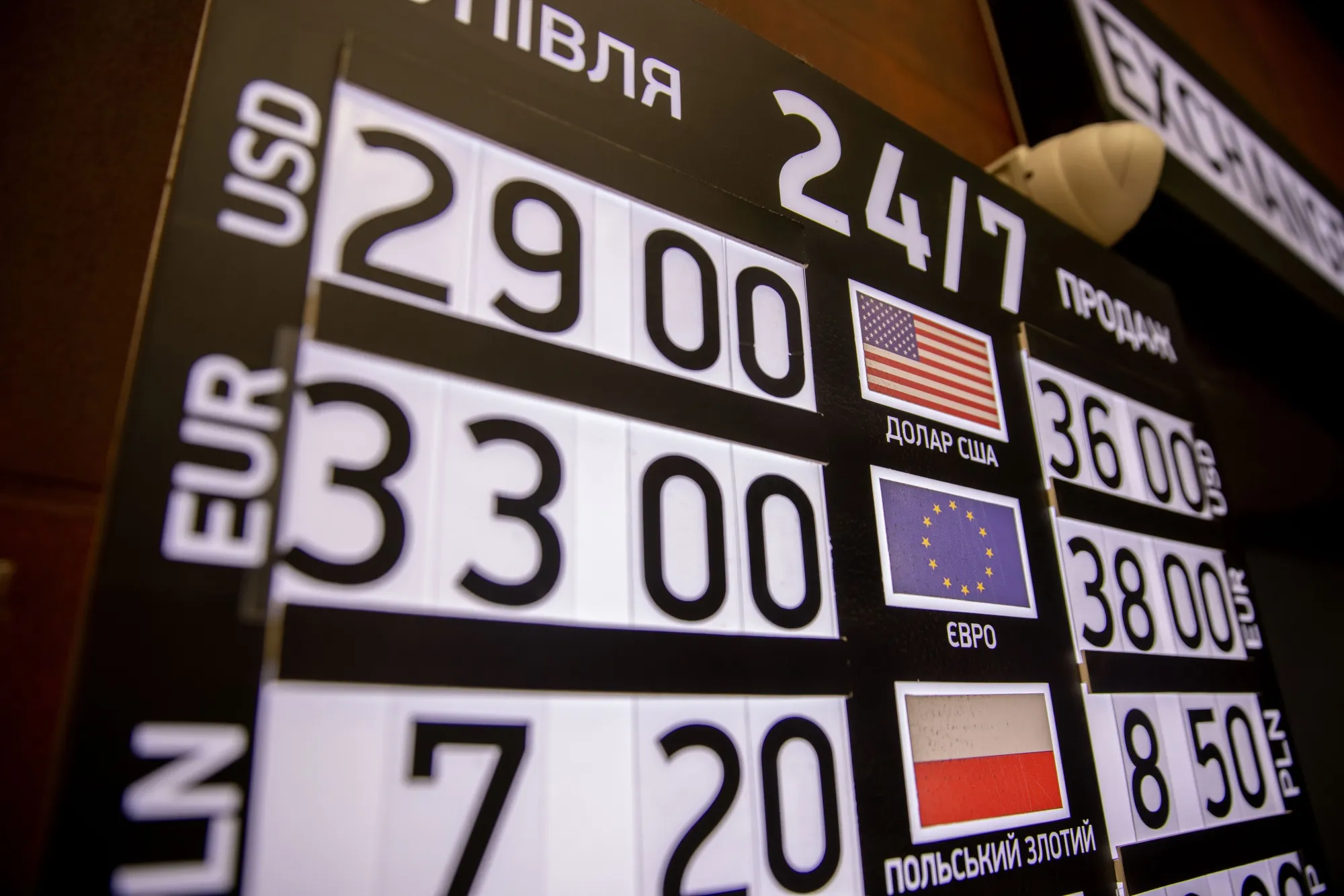 A foreign currency exchange rate sign outside a 24/7 exchange kiosk in Lviv, Ukraine, on Monday, Feb. 28, 2022.&nbsp;