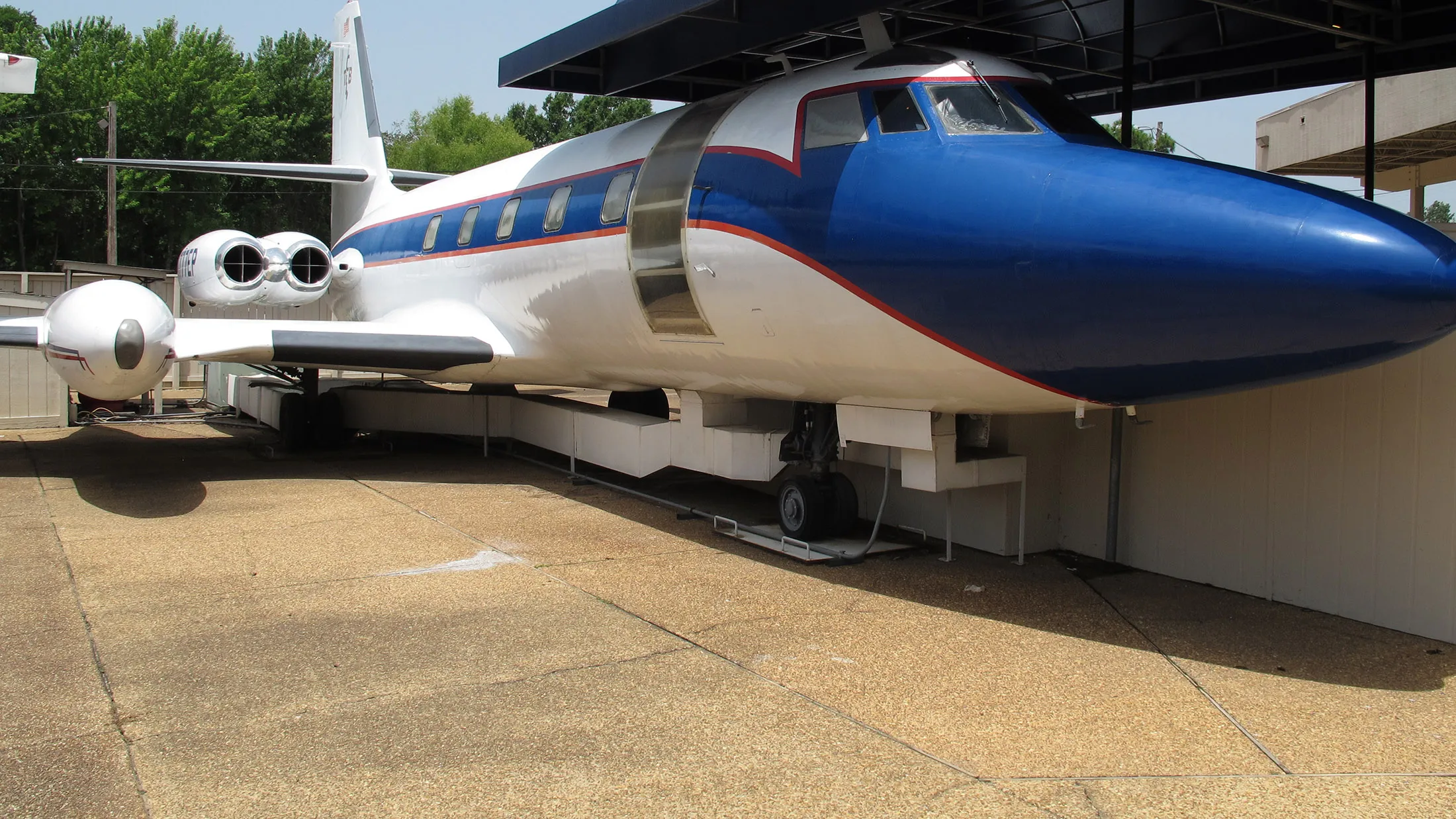 FILE - This Tuesday, July 1, 2014 file photo shows the Hound Dog II, one of two jets once owned by late singer Elvis Presley on display at Graceland in Memphis, Tenn. Fans have posted critical comments on Facebook since The Associated Press reported last week that Elvis Presley Enterprises informed the owners of the Hound Dog II and another jet, the Lisa Marie, to prepare to remove the planes when their agreement ends next April.
