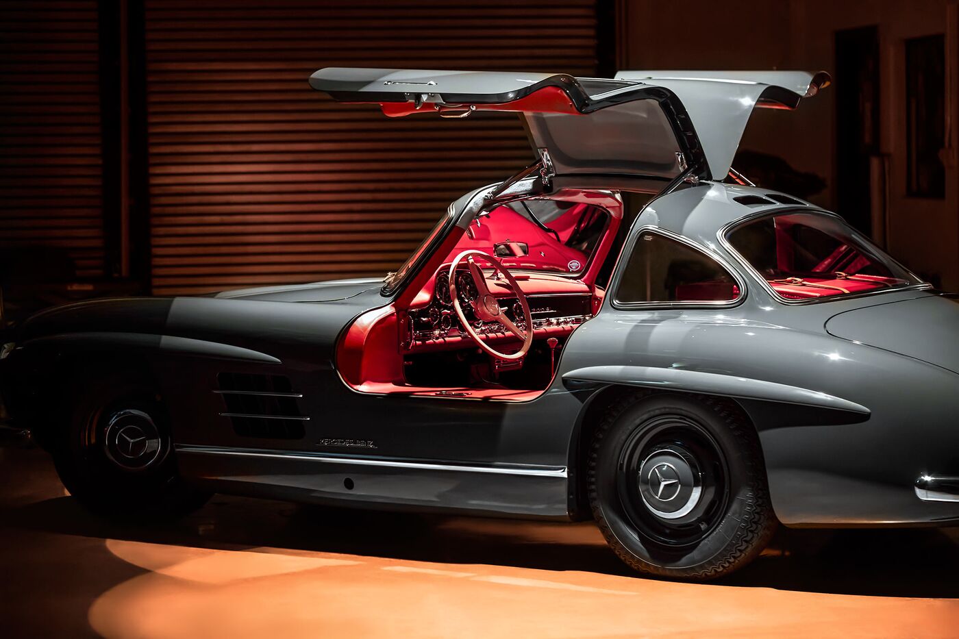 A 1956 Mercedes-Benz 300SL with gullwing doors at the Barn Miami.