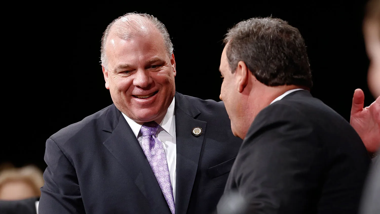 New Jersey Senate President Steve Sweeney greets New Jersey Gov. Chris Christie prior to being sworn in for his second term on January 21, 2014 at the War Memorial in Trenton, New Jersey.
