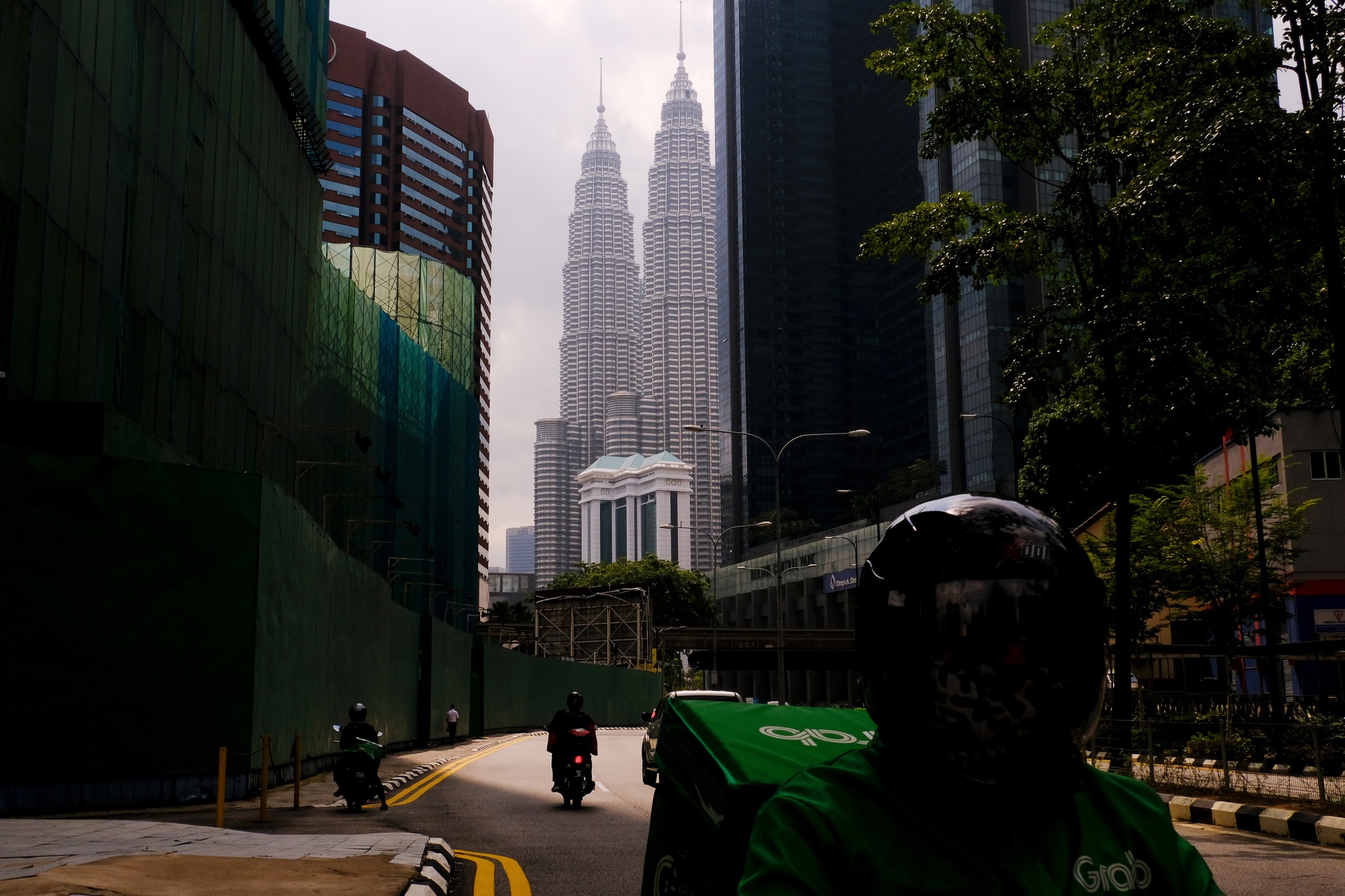 Malaysia Lowers Growth Forecast On Worsening Virus Outbreak Bloomberg