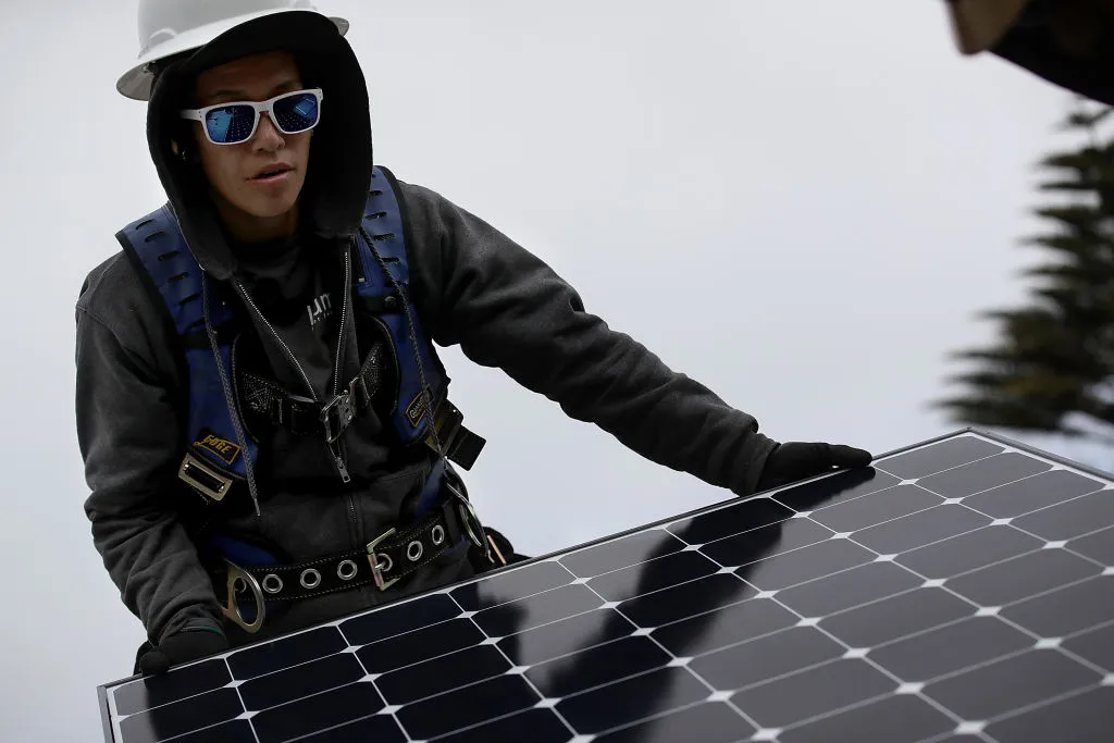 A solar panel being installed on the roof of a home&nbsp;in San Francisco.