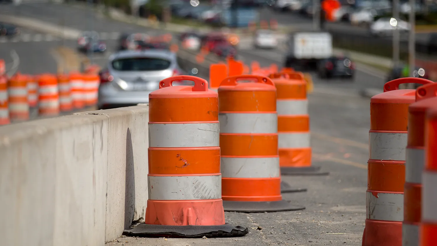 Traffic barrels sit on the Seminary Road overpass above Interstate 395 (I-305) during a Virginia Department of Transportation (VDOT) project in Alexandria, Virginia, U.S., on Wednesday, July 29, 2015.
