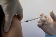Booster Vaccination As South Korea Tightens Virus Curbs to Fight Record Case Surge