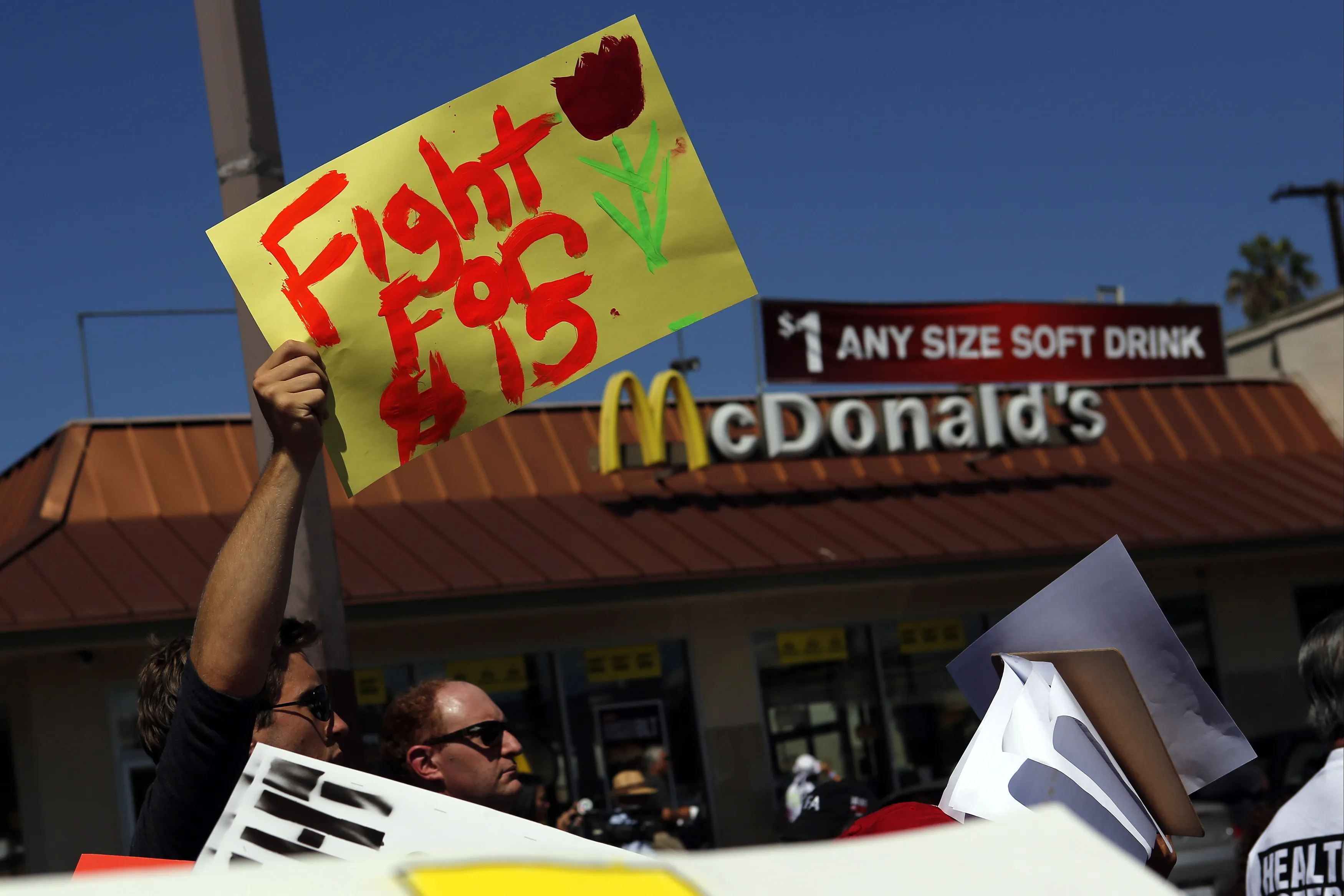 Fast-food workers organized by the Service Employees International Union protest outside of a McDonald's restaurant in Los Angeles in 2013.
