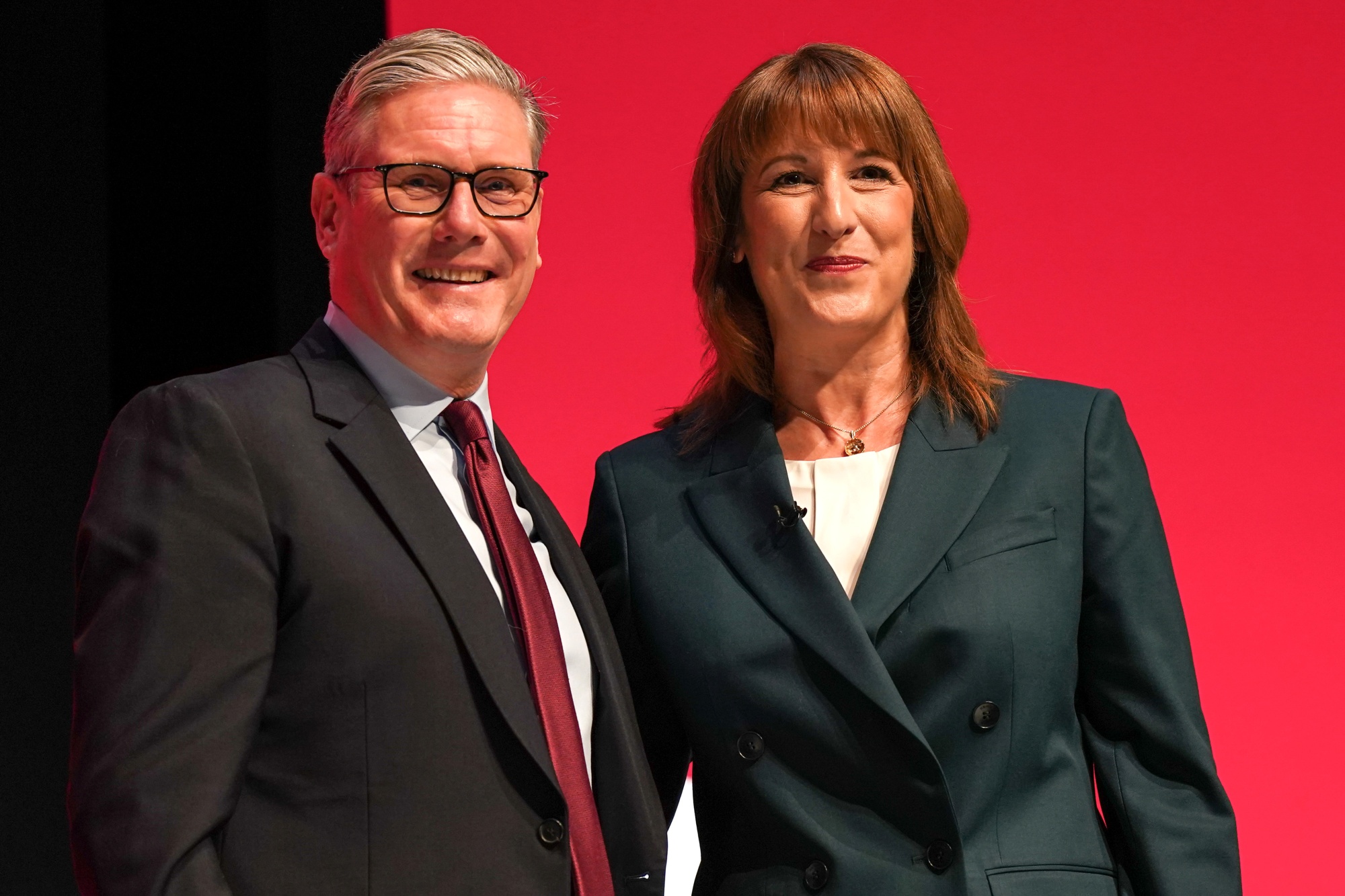 LIVERPOOL, ENGLAND - SEPTEMBER 29: Rachel Reeves, Chancellor of the Exchequer, reacts with Prime Minister Sir Keir Starmer after delivering her key note speech on day two of the Labour Party conference at ACC Liverpool on September 29, 2025 in Liverpool, England. Labour Conference is being held against a vastly different backdrop to last year when the party had swept to power in a landslide general election victory. A year on and polling shows three quarters of Britons (74-77%) say they have little to no trust in the party on the cost of living, immigration, taxation, managing the economy, representing people like them, or keeping its promises. (Photo by Ian Forsyth&#x2F;Getty Images) Photographer: Ian Forsyth&#x2F;Getty Images Europe