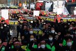 Truck drivers and members of the Korean Confederation of Trade Unions during a protest at the Uiwang Inland Container Depot in Uiwang, South Korea, on Nov. 24.