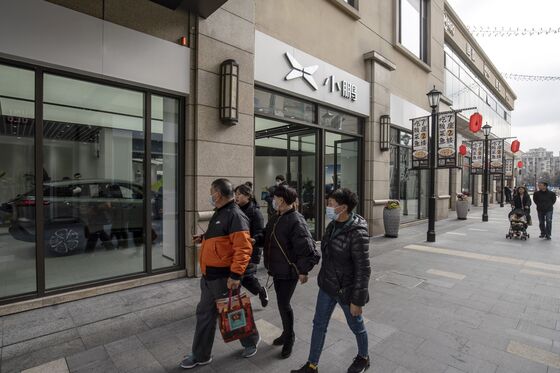 Million-Dollar Showrooms in Malls New Battleground for China EVs