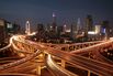 Shanghai's Roadways And Skyline Are Lit Up At Night