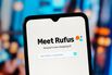 In this photo illustration, the Amazon Rufus AI logo is seen