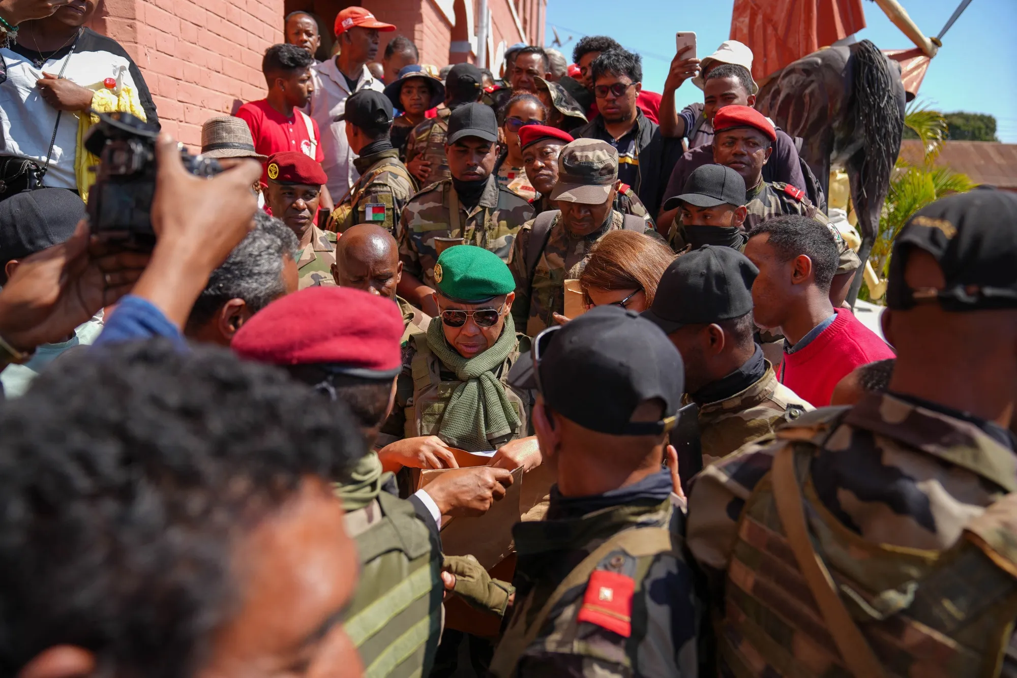 Madagascar’s new leader, army colonel Michael Randrianirina, center, was sworn in on Oct. 17.