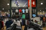 Under Armour Inc. clothing is displayed for sale at Dick's Sporting Goods Inc. store in Sterling Heights, Michigan, U.S., on Thursday, Aug. 18, 2016. Dick's Sporting Goods Inc. released earnings figures on Aug. 16.