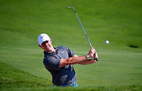 Rory McIlroy, coming back from an ankle injury, plays a bunker shot during a practice round prior to the 2015 PGA Championship at Whistling Straits in Sheboygan, Wisconsin, on Aug. 12, 2015.