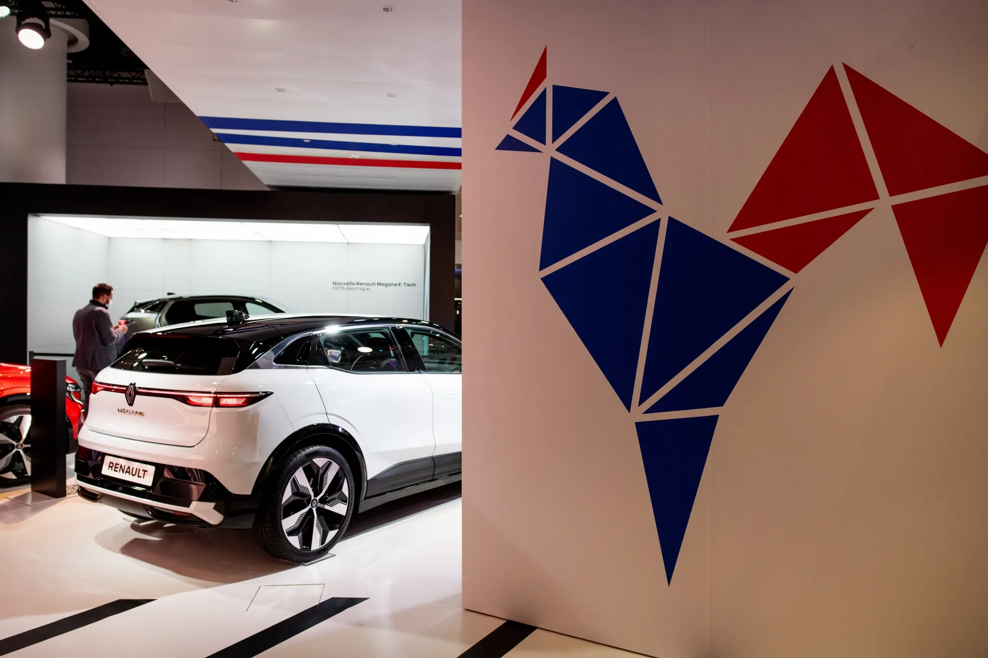 A Renault Megane E-tech electric vehicle at the L'Atelier Renault flagship store.