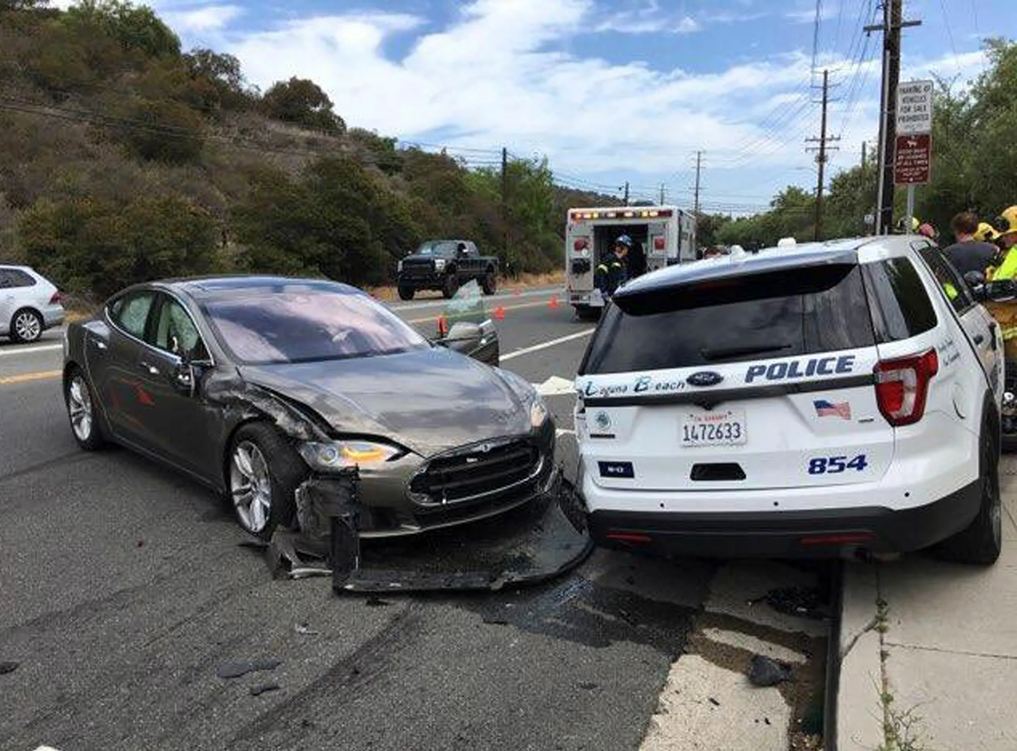 A Tesla sedan in autopilot mode after crashing into a parked police cruiser in Laguna Beach, California in 2018. 
