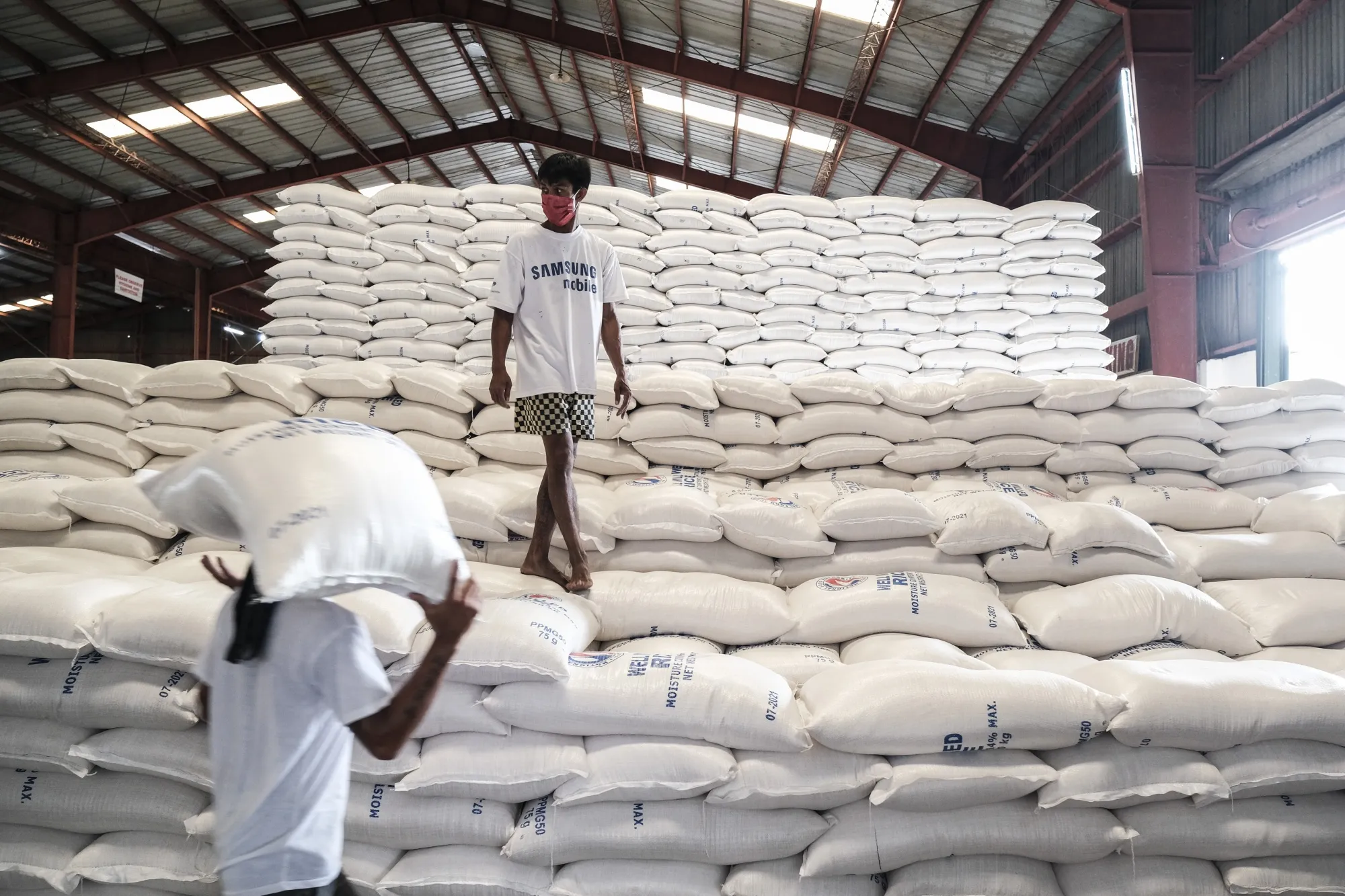 Sacks of rice inside a&nbsp;National Food Authority warehouse in Malolos town, Philippines.
