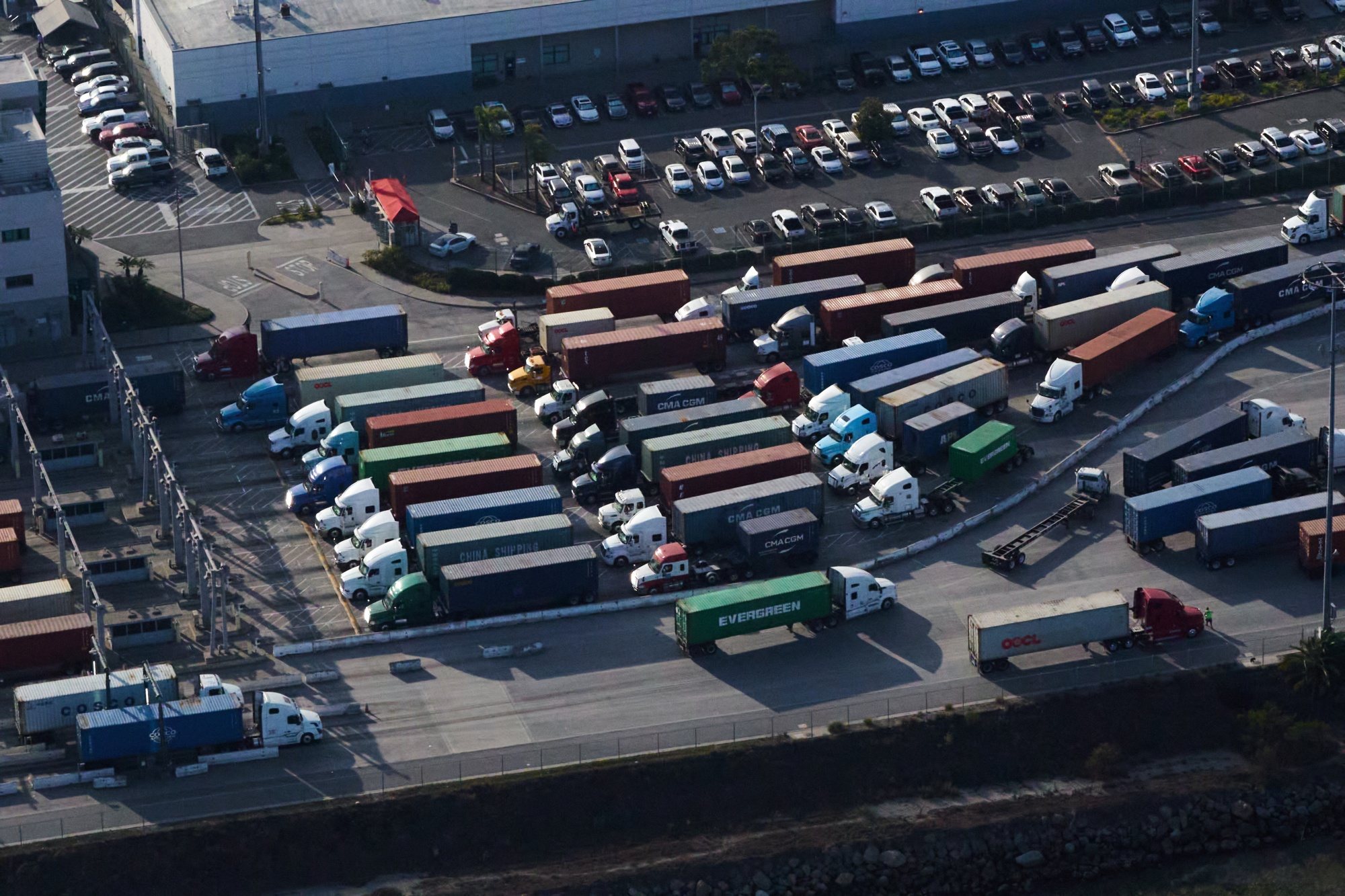 Trucks enter and exit the Port of Los Angeles in California.