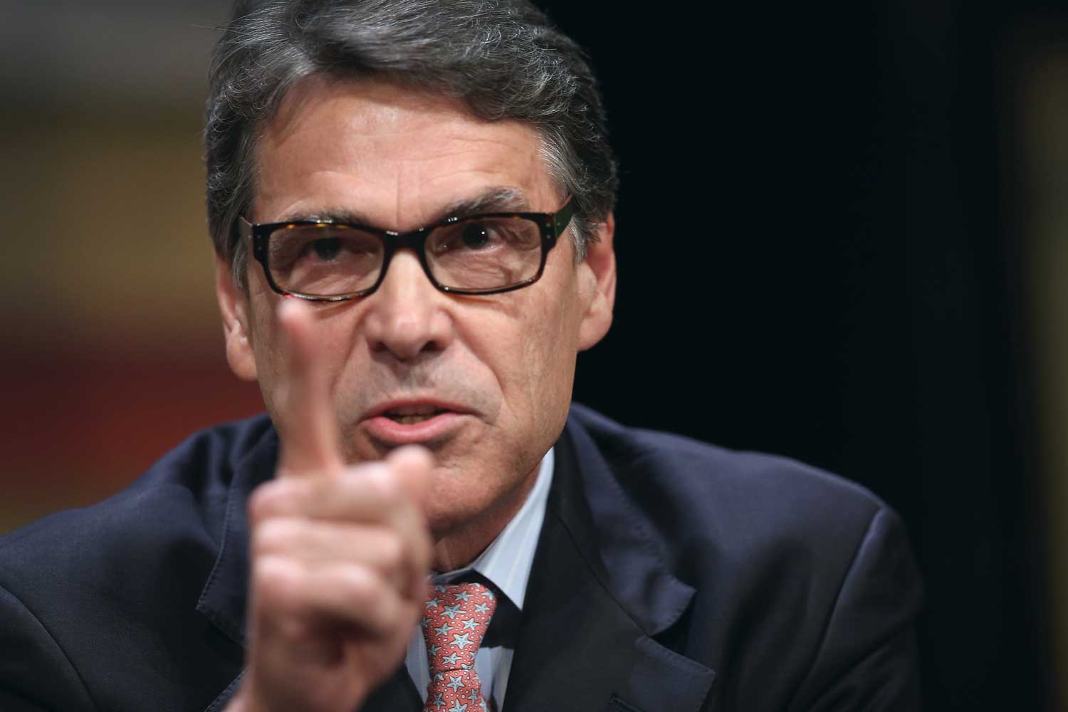 Republican presidential candidate and former Texas Governor Rick Perry fields questions at The Family Leadership Summit at Stephens Auditorium on July 18, 2015 in Ames, Iowa. According to the organizers the purpose of The Family Leadership Summit is to inspire, motivate, and educate conservatives
