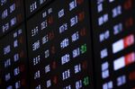 An electronic stock board is displayed at the Tokyo Stock Exchange (TSE), operated by Japan Exchange Group Inc. (JPX).
