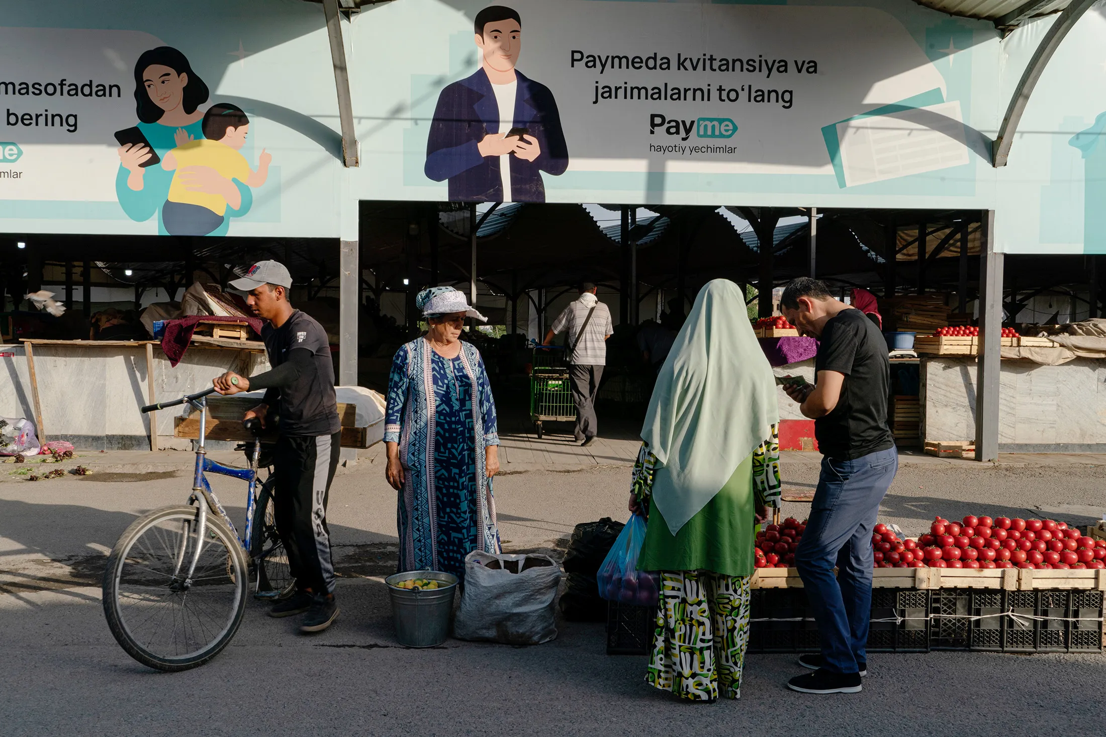 A Payme advertisement at the Chorsu Bazaar in Tashkent.&nbsp;Payme&nbsp;is part of TBC Digital,&nbsp;a digital payments provider for individuals and small businesses.