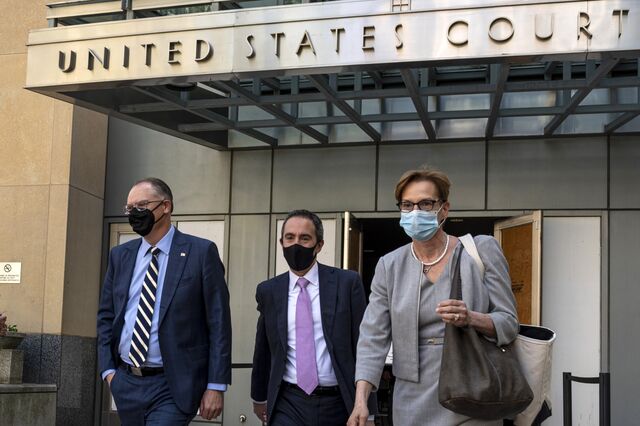 Sweeney (left) exiting the courthouse in Oakland, California.