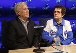 FILE -Los Angeles Dodgers owner & chairman Mark Walter, left, introduces to the baseball team ownership group, tennis champion Billie Jean King at a news conference in Los Angeles, Friday, Sept. 21, 2018. North America’s top women’s hockey players are teaming up with former tennis star Billie Jean King and Los Angeles Dodgers chairman Mark Walter to explore launching a pro league within the next year, a person with direct knowledge of the agreement told The Associated Press on Tuesday night, May 24, 2022. (AP Photo/Alex Gallardo, File)